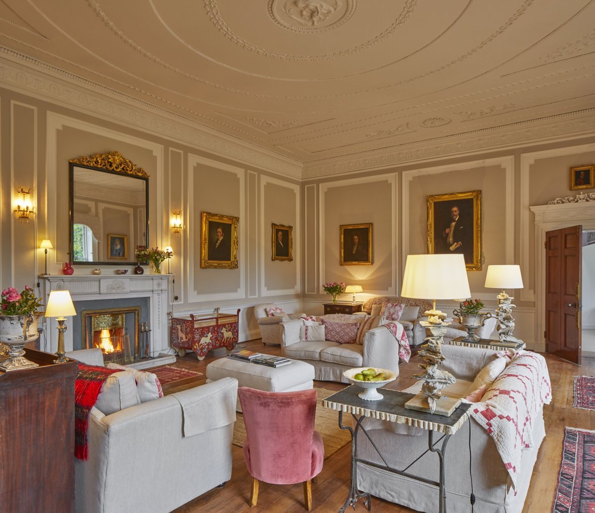 The drawing room is dominated by a 250-year old ceiling with ornate plasterwork created by a master craftsman